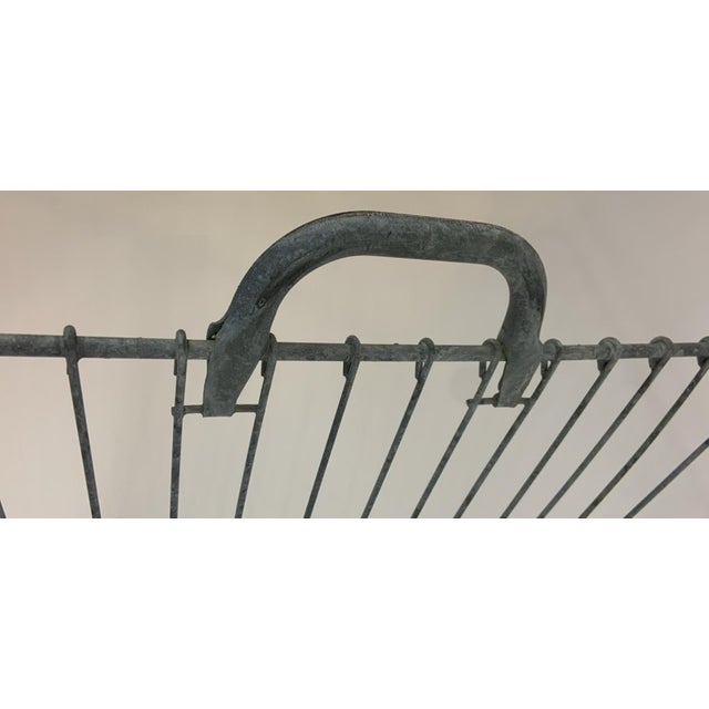 Great vintage tapered wire (galvanized metal) basket with handles, rubber feet. Measures 27.5" wide x 17" deep x 15.5"...