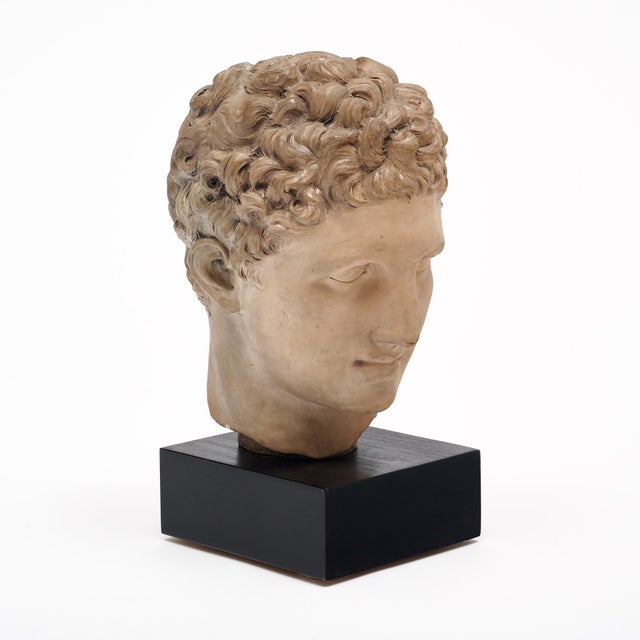 French Art Deco period Hermes sculpture made of plaster and supported by an ebonized wood base. This piece is in very nice...