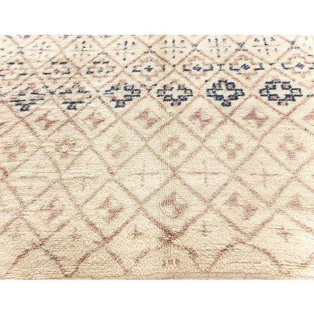 Vintage Moroccan Berber Rug Size: 5'8" × 9'8" (172 × 294 cm) This authentic Moroccan Berber rug from the 1950s showcases a...