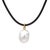 A beautifully organic and understated necklace pairing a large baroque South Sea-style pearl with a dark leather cord and...