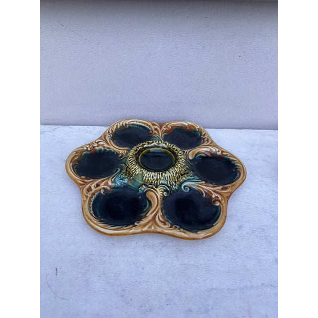 French Majolica oyster plate with yellow acanthus leaves, circa 1900.