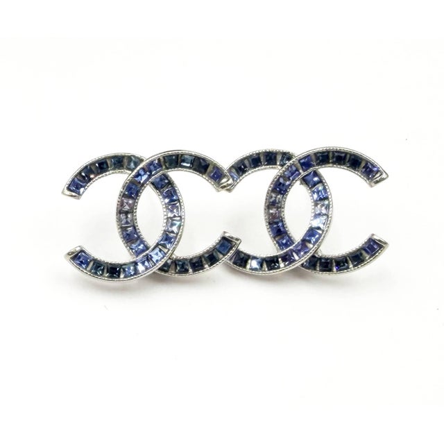 Chanel Silver CC Blue Princess Crystal Piercing Earrings *Marked 15 *Made in France -It is approximately 0.75" x 0.25"....
