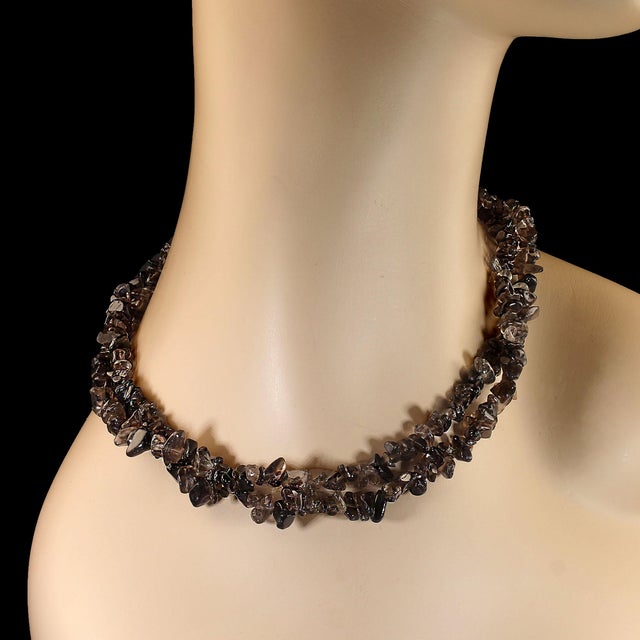 Elevate your style with this 34-inch polished chip necklace, designed to bring both elegance and versatility to your...