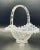A ruffle edged tabletop basket with a textured hobnail pattern and opalescent glass. Ships within 1-2 days using USPS. All...