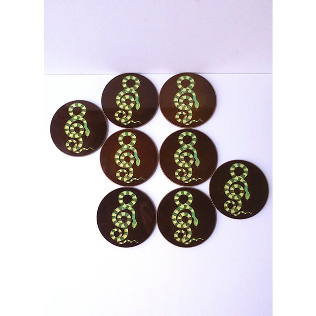 A great set of eight (8) serpent snake cocktail drinks coasters. Coasters feature a bright green 'rattlesnake' in a twist...