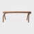 This sculptural bench from rural China is shaped from a single, continuous piece of elmwood. By controlling its growth as...