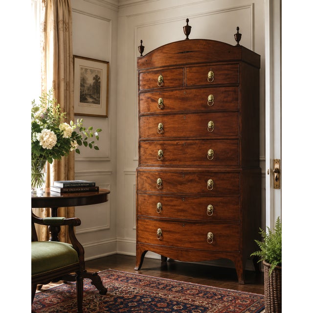 Exceptional early 19th-century English Regency mahogany bow-front chest-on-chest, circa 1810–1820, featuring richly...