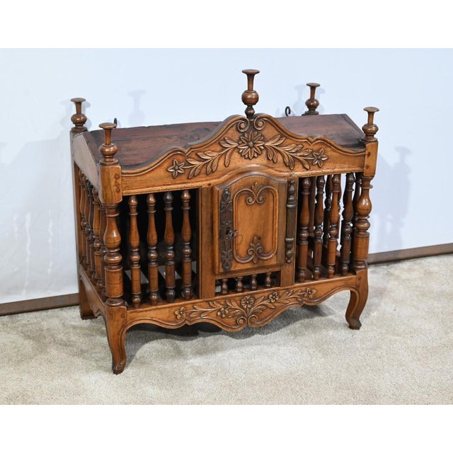 At a time when bread, which was a precious commodity, had to be kept at least for a week, strange small furniture...