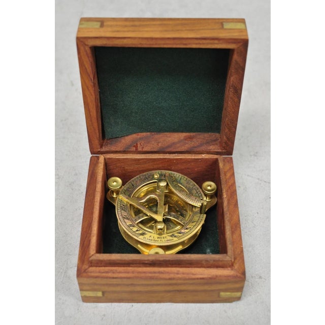 Vintage English Campaign Style Brass Round Sundial Compass with Small Rosewood Box. Circa Late 20th Century. Measurements:...