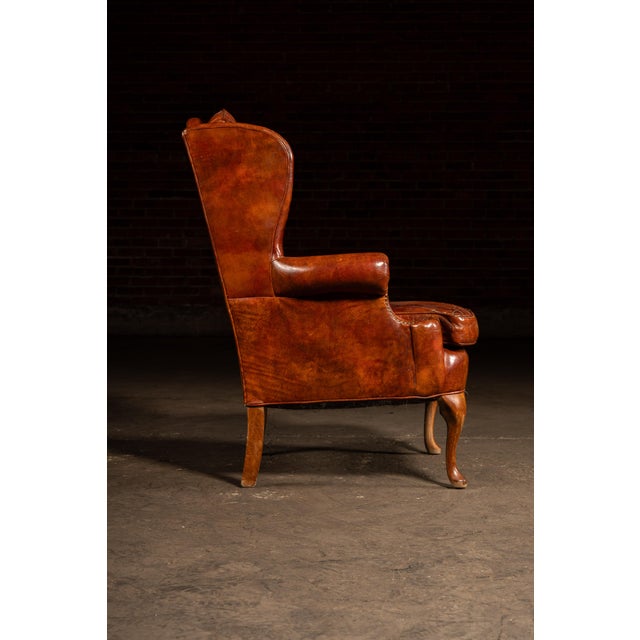 Mid 20th Century Tufted Leather Wingback Armchair in Burnt Amber For Sale - Image 4 of 17