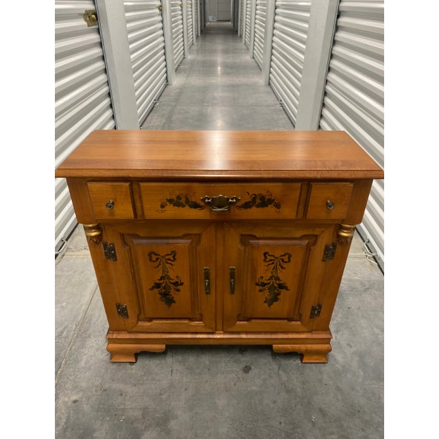 Solid wood side board cabinet made of hard rock maple by the Young Republic Company Tell City Indiana. In good vintage...