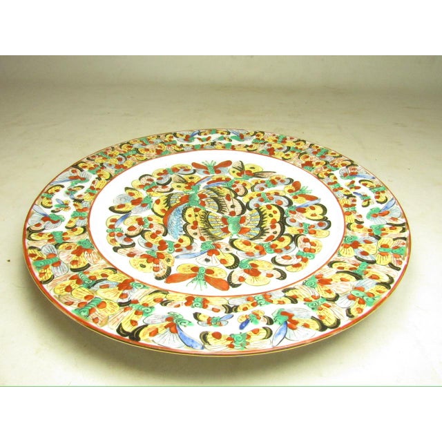 Chinese thousand butterfly pattern porcelain plate, c.1970’s A colorful design and good condition plate in the thousand...