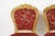 Beautiful pair of antique-style giltwood side chairs designed in the elaborate Louis XV Rococo Revival style, which...