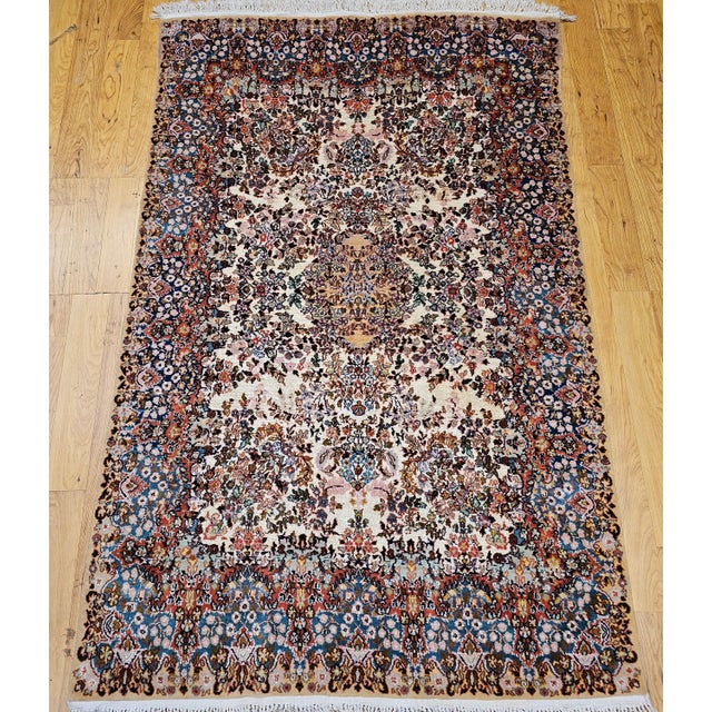 This vintage Persian Kerman Lavar area rug is an extraordinary example of refined Persian weaving, celebrated for both its...