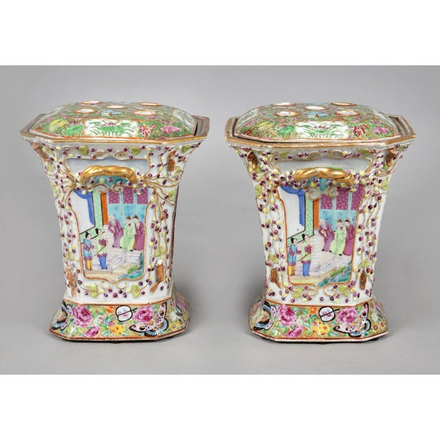 Chinese Export porcelain Famille Rose bough pots, in octagonal form with canted corners of berries and vines, flanked with...