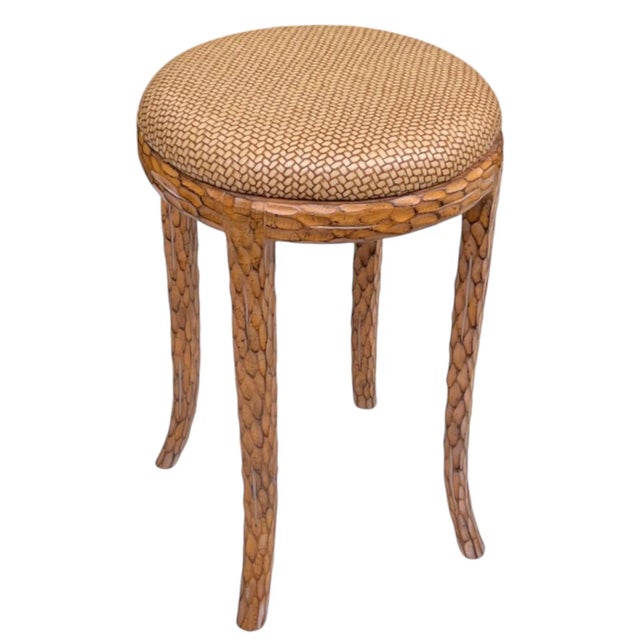 This is an interesting little stool! It has a faux bois carved frame with an oil cloth faux wicker upholstery. The stool...