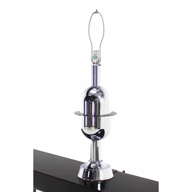 Nice chrome bullet capsule shape table lamp.