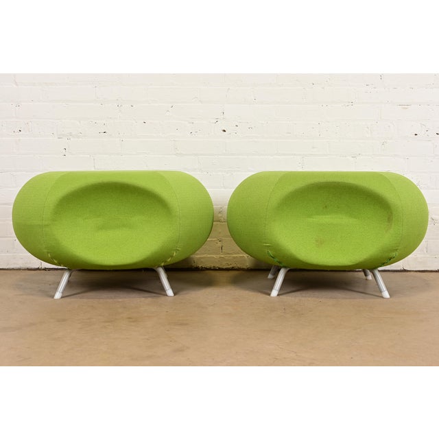 A gorgeous pair of Mid-Century Modern style "Pebble" scalloped stools or ottomans In the manner of Knoll or Herman Miller...
