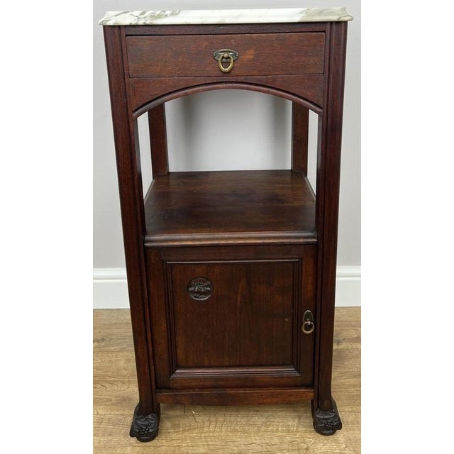 Bring timeless French elegance to your bedroom with this Antique French walnut bedside table , featuring a beautifully...