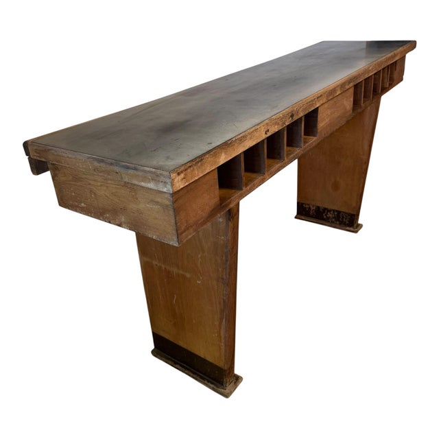 Dimensions: 72″ W × 19″ D × 36″ H Cubby interiors: 4″ W × 4″ H × 10″ D Sourced from a bank, this vintage wooden bank...