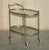 This is a Art Deco circa 1920's brass and frosted glass drinks trolley circa 1920 A good looking well made and decorative...