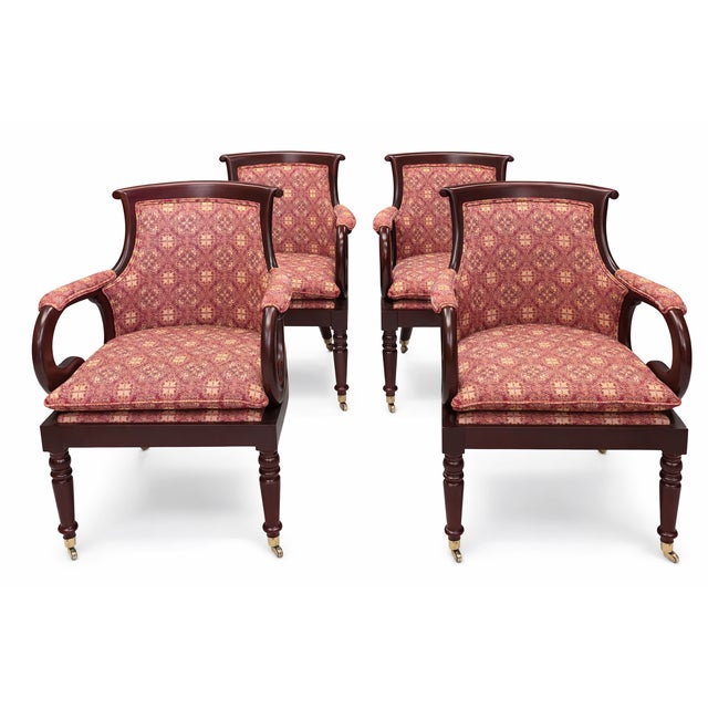 This Set of Four Hancock & Moore “Jockey Club” Armchairs is striking and elegant with richly patterned upholstery,...