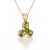 A vibrant three-stone design featuring oval-cut natural peridots arranged in a graceful trefoil formation, secured in a...