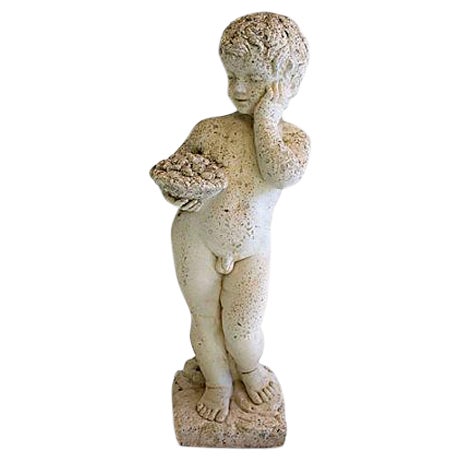 Putto garden statue, eroded from decades of outdoor exposure. Concrete/stone. White. Wear commensurate with age. Marked...