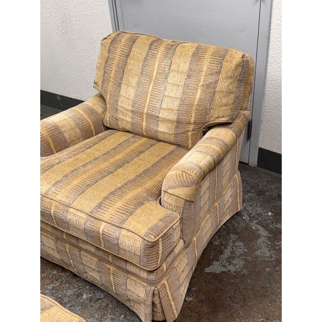 Design Plus Gallery presents a Chair + Ottoman from Vanguard Furniture. The chair has a generous silhouette with English...