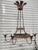 This iron and crystal chandelier was the 1st design produced by Nierman Weeks, inspired from a chandelier in a whitewash...