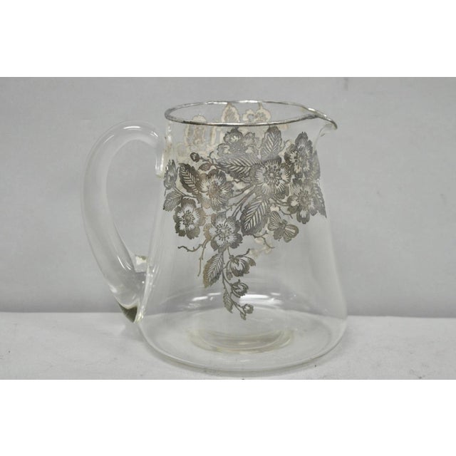 Vintage Cambridge Art Nouveau Floral Sterling Silver Overlay Crystal Glass Footed Water Pitcher. Item features blown glass...