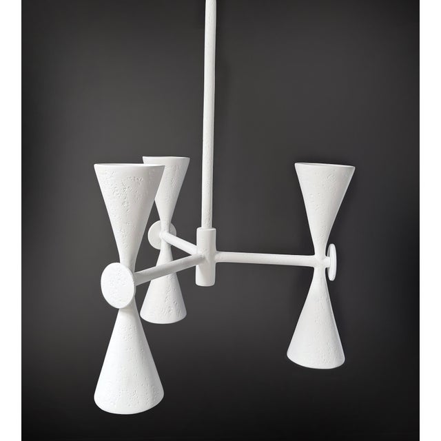 The Villette Chandelier is a sculptural study in geometry, defined by intersecting forms and Bourgeois Boheme Atelier's...