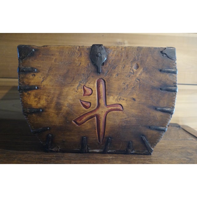 A very beautiful early Chinese rice gathering vessel which is made of wood with a beautiful patina and Chinese characters...