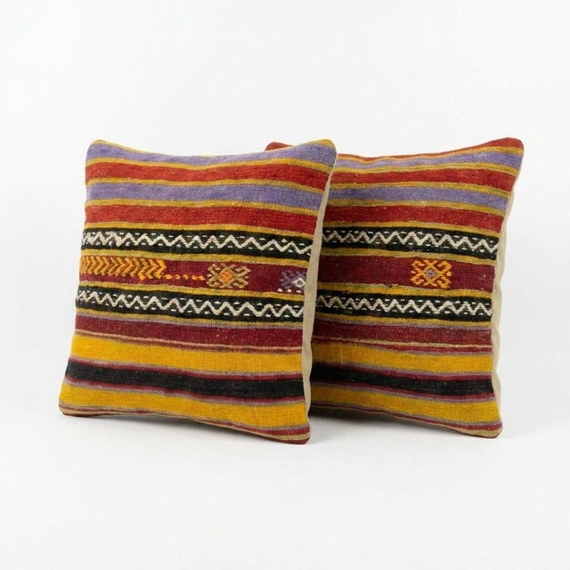This beautiful 20'' x 20'' Turkish Kilim pillow cover set was made from authentic handwoven flatweave kilim. The...