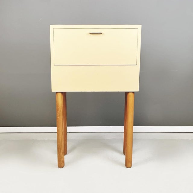 Italian Mid-Century modern Sideboard or bar cabinet in beige formica and wood, 1960s Sideboard or bar cabinet with...