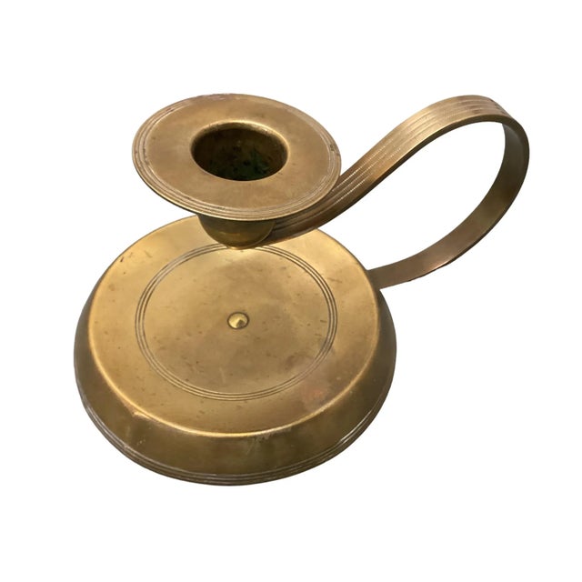 Set of 2 Rare brass candlesticks With looped handle in the form of a swan's neck. Original patina