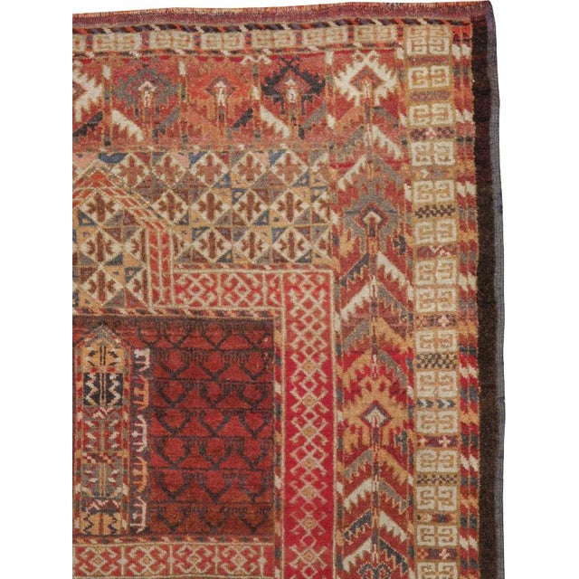 A second quarter of the 20th century Central Asian Bokhara carpet.