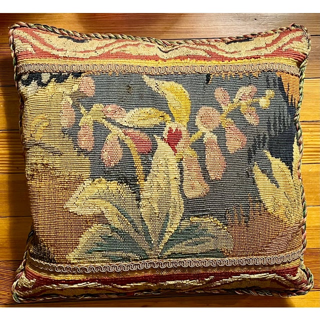 Antique 19th century French floral tapestry made into a pillow. Muted shades of tan, brown, red, blue and green. Finished...