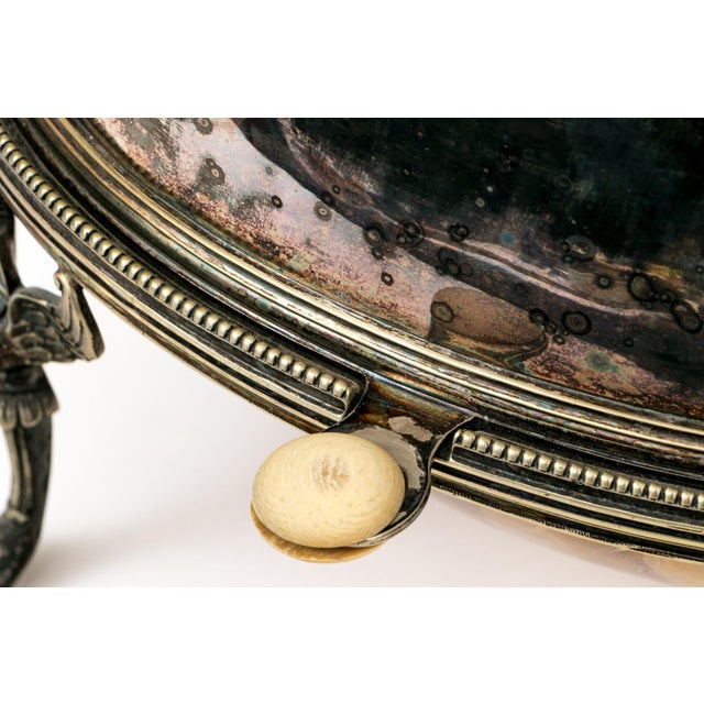 Antique English silver-plated bread warmer by Henry Wilkinson & Co. of Sheffield, featuring an elegant domed form raised...