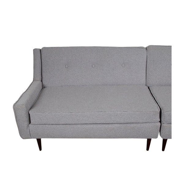 A beautiful pair of mid-century modern loveseat/sofas, in new upholstery fabric and high-density foam. Each with an...