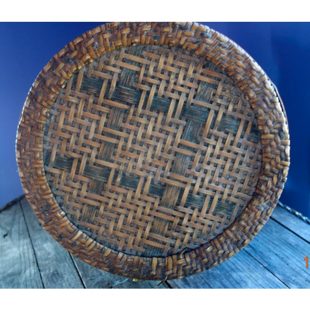 Midcentury or earlier storage basket, handwoven of split bamboo and rattan; the bamboo strips have been staiined or dyed a...