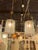This product is a pair of Italian modern pale green frosted glass lanterns, perfect for adding a touch of elegance and...