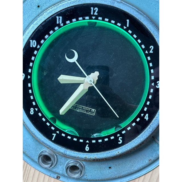 Fantastic original Glo Dial Art Deco Neon Wall Hanging Clock. This beautiful clock has original green interior neon and...