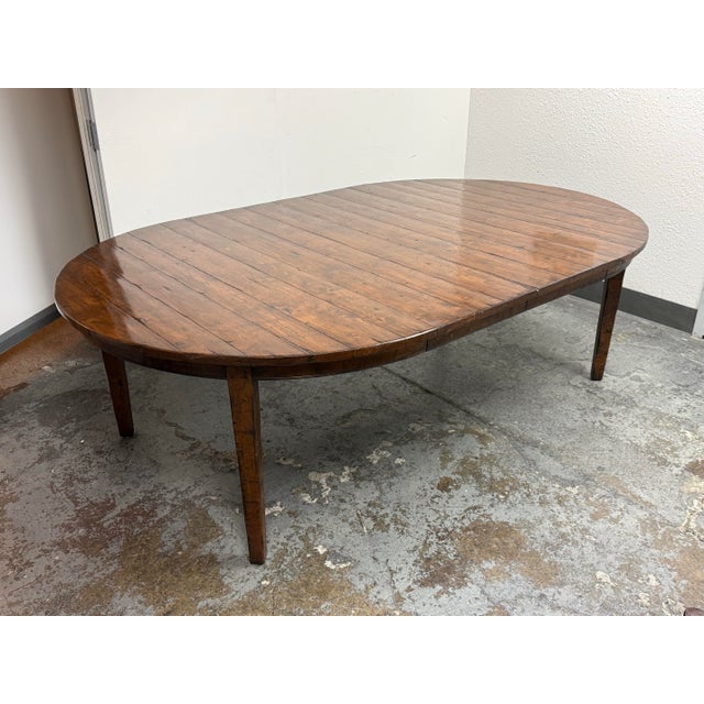 Design Plus Gallery presents a Melrose Collection Extendable Dining Table by Guy Chaddock & Co. The round wood tabletop...