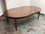 Design Plus Gallery presents a Melrose Collection Extendable Dining Table by Guy Chaddock & Co. The round wood tabletop...