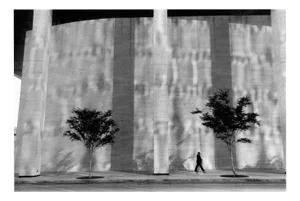 Michael Ormerod, Man Walking in Front of Building, Houston, Photographic Print