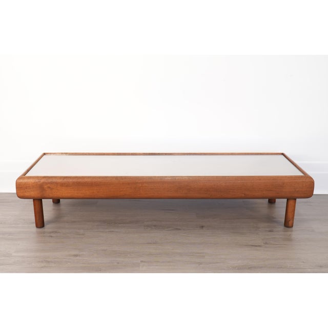 A stunning mid-century modern coffee table by renowned designer Adrian Pearsall for Craft Associates. The 2185-TW model...