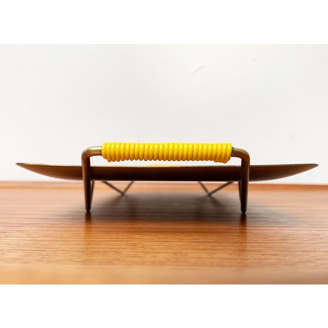 Mid-Century German Brass Tray from WMF, 1960s, in Very Good conditions. Designed 1960 to 1969 This piece has an...