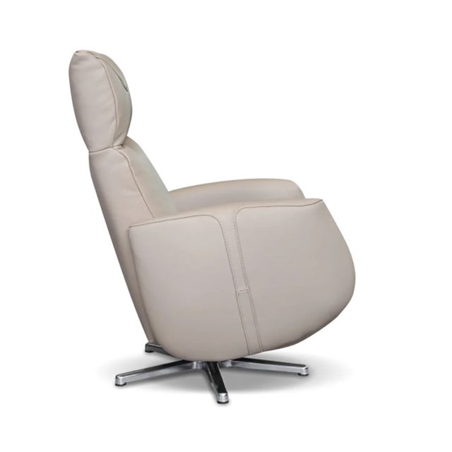 This Italian leather swivel recliner combines advanced comfort technology with refined contemporary design. Upholstered in...