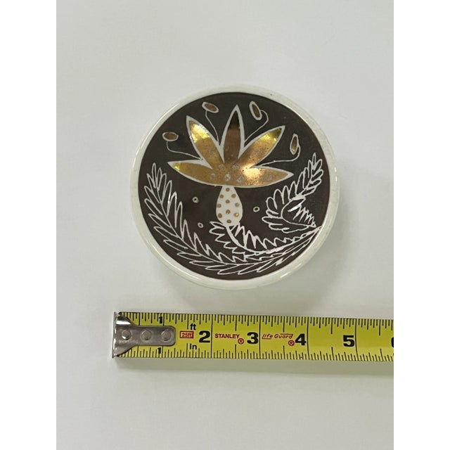 Hand painted small bowl with flower motif. Great for a catchall. This is an original hand painted and signed piece....